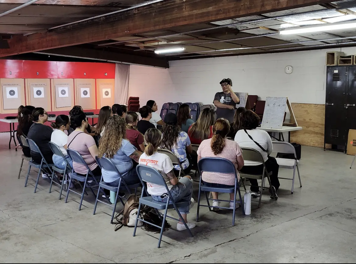 Michael Gutterres teaching a women's firearms class